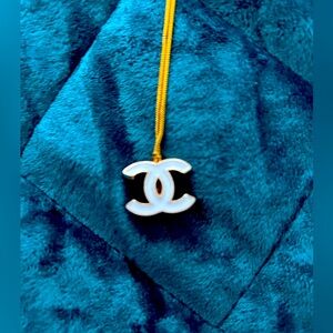 CC Zipper Pull Necklace.